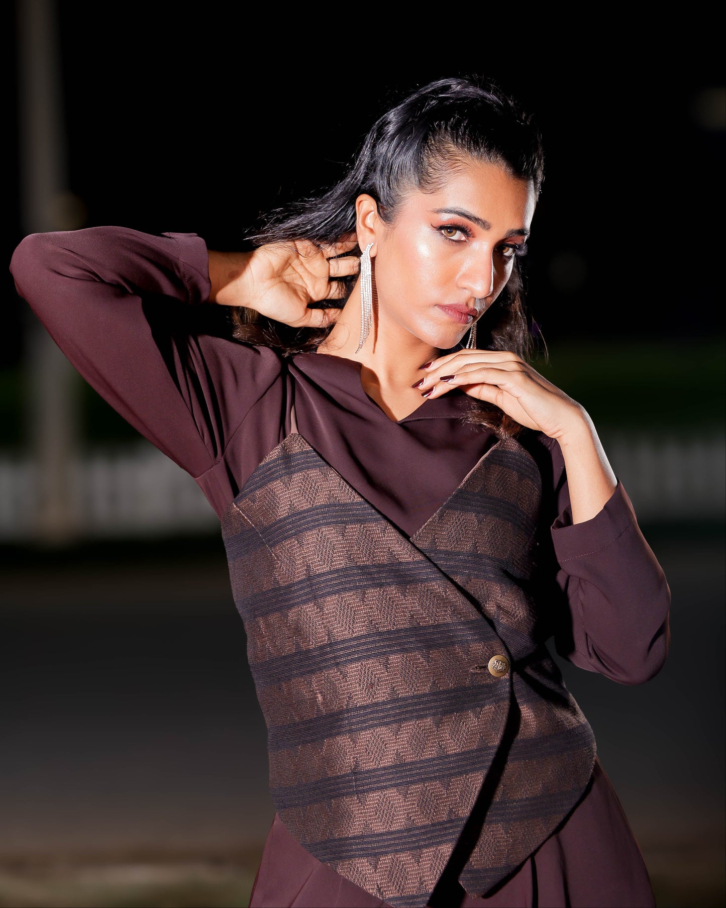 Brown black Cultural heritage fashion using traditional West African weaving.