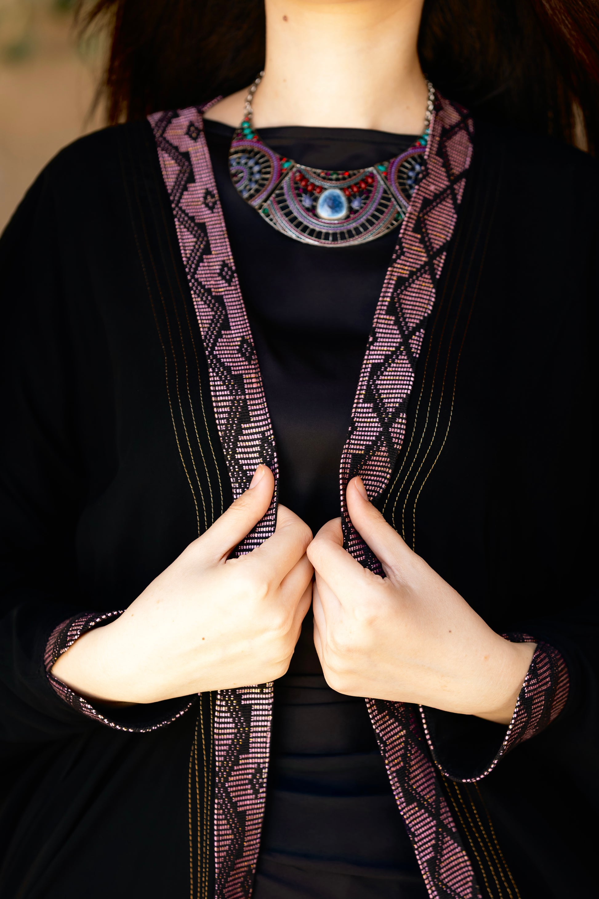 Black rose gold eid outfit with heritage collar and sleeve details , traditional necklace